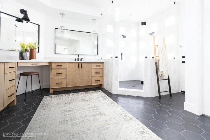 A lifestyle setting enriched by bold black hexagonal porcelain tiles in a 10" matte finish, making a striking statement with Makoto Kuroi Black Hex Matte Porcelain.