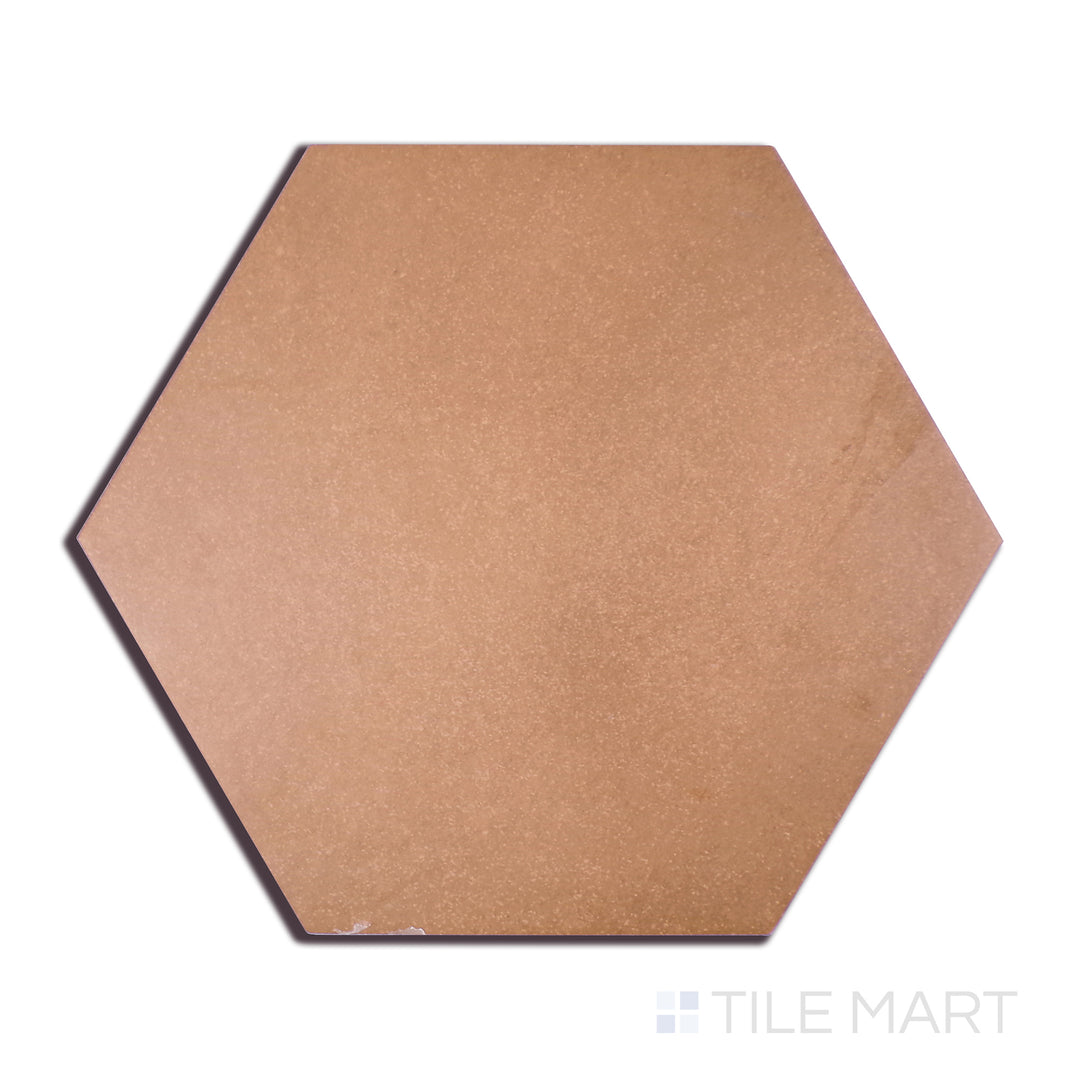 A crisp close-up of Makoto Umi Terracotta 10" Hex Matte Porcelain tile reveals its rich terracotta tone and matte hexagonal structure, blending tradition with modern geometry.