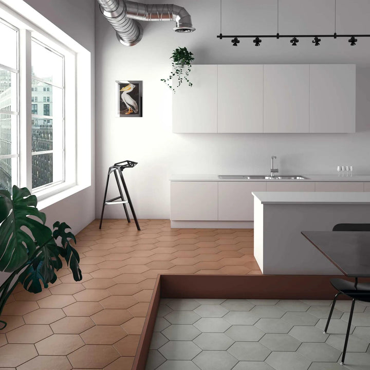 A lifestyle-inspired ambiance highlighted by terracotta hexagonal porcelain tiles in a 10" matte finish, bringing earthy tones to modern designs with Makoto Umi Terracotta Hex Matte Porcelain.