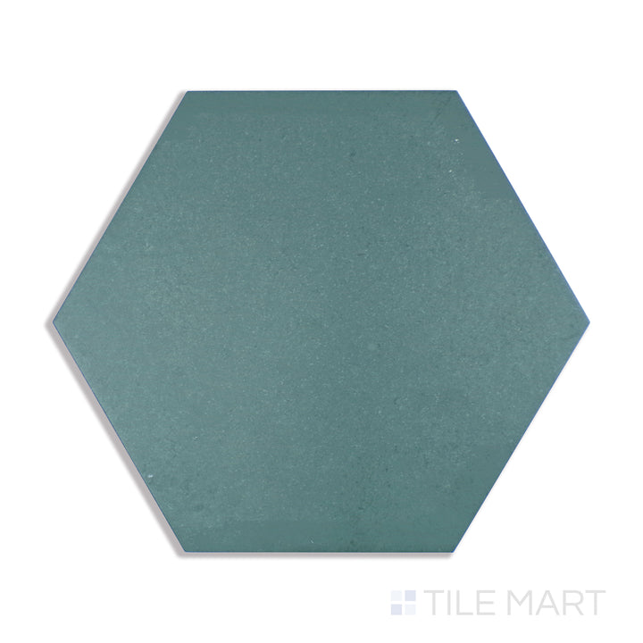 A macro shot of Makoto Midori Green 10" Hex Matte Porcelain tile captures its lush green tone and hexagonal shape, creating a fresh and organic atmosphere.