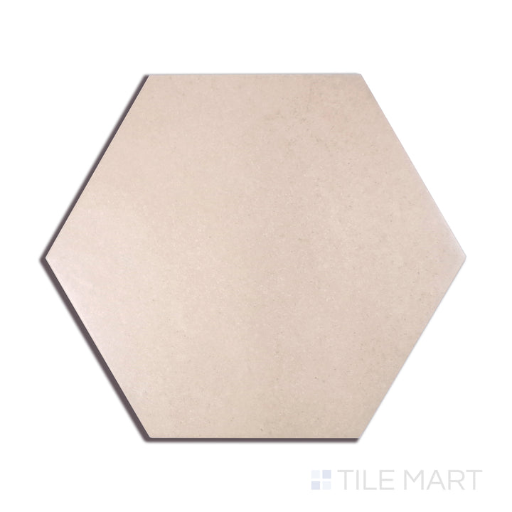 A close-up perspective of Makoto Momoiro Blush 10" Hex Matte Porcelain tile showcases its delicate pink shade and hexagonal format, perfect for soft and inviting interiors.