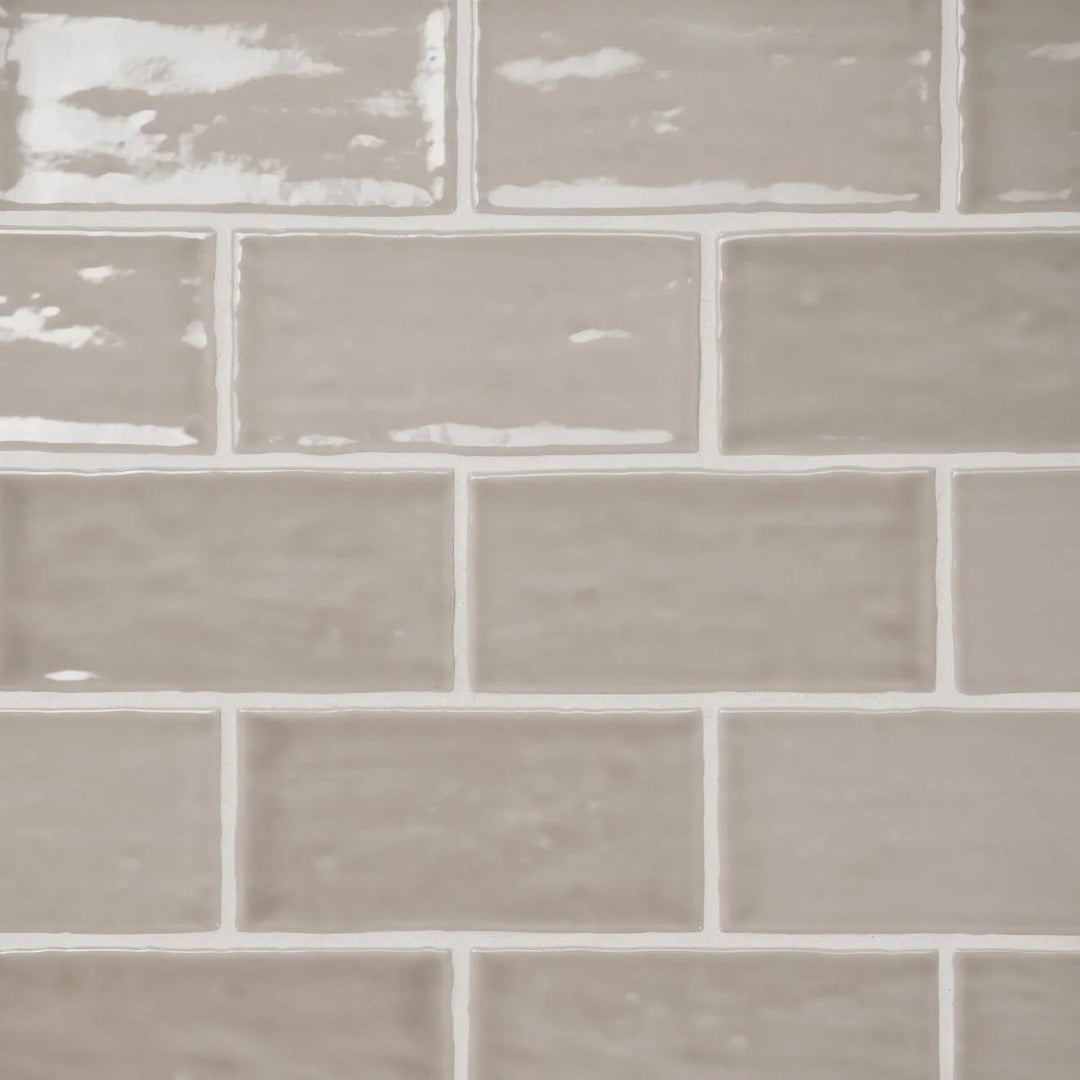 A bird’s-eye view of the Marin Coastal Cliff 2.5X5 Gloss Glazed Ceramic showcases its cool-toned, stone-like aesthetic with a glossy glaze, mirroring the essence of rugged coastal landscapes.