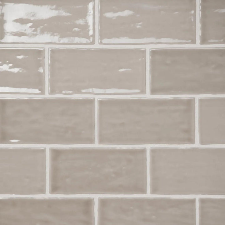 A bird’s-eye view of the Marin Coastal Cliff 2.5X5 Gloss Glazed Ceramic showcases its cool-toned, stone-like aesthetic with a glossy glaze, mirroring the essence of rugged coastal landscapes.