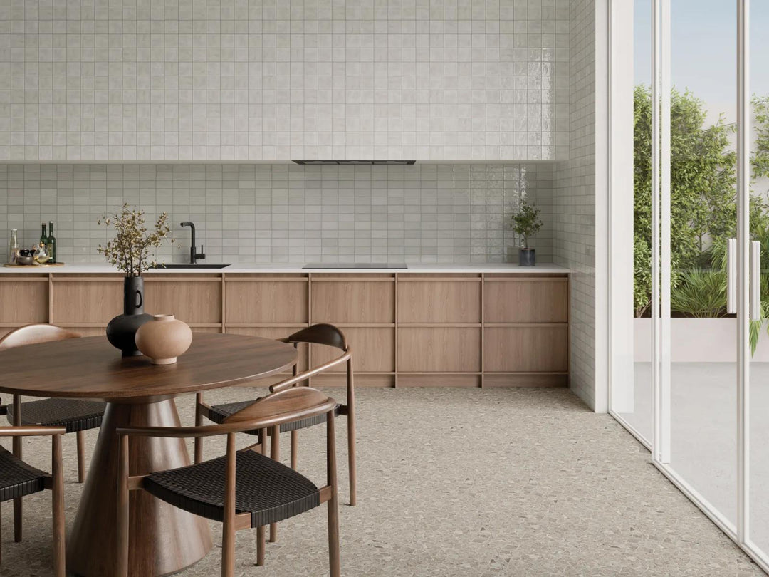 Soft, neutral tones define the refined look of Marin Pebble Gray, a 2.5x5 glossy glazed ceramic tile that seamlessly blends into a variety of styles.