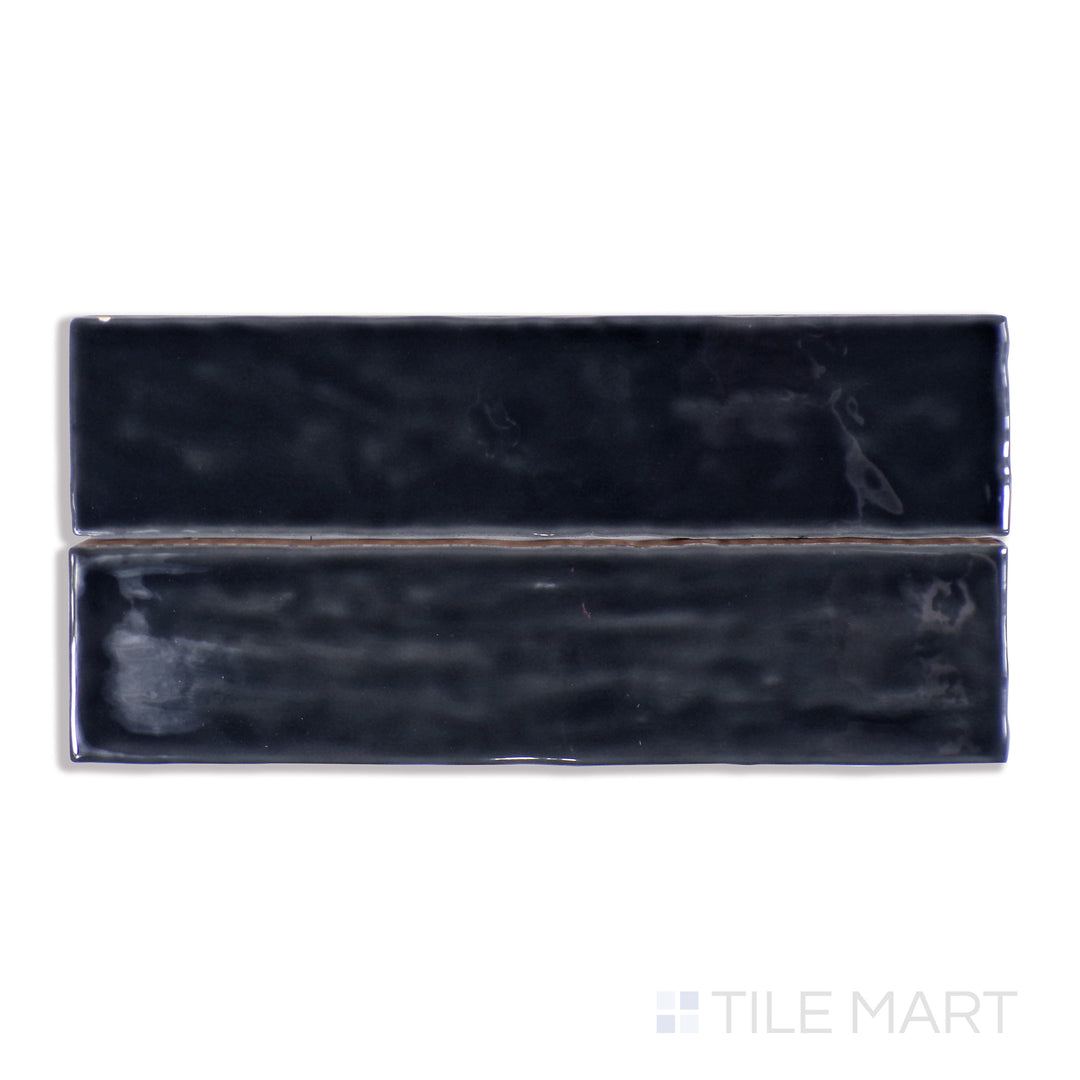 An up-close look at Marin Black Sea 2.5X10 Gloss Glazed Ceramic tile captures its dramatic black tone and sleek glaze, adding a bold and sophisticated touch.