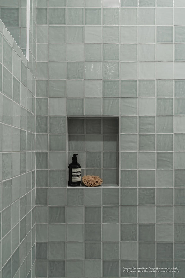 A refreshing space showcasing Marin Aloe Green 4X4 Gloss Glazed Ceramic, where the soft green tones bring a sense of nature and tranquility to the design.