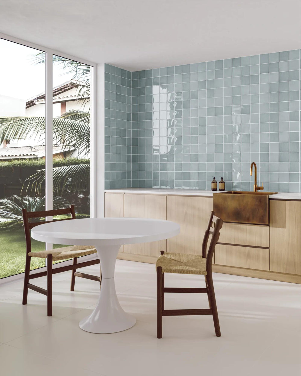 Serene and sophisticated, Marin Misty Blue 4x4 glossy glazed ceramic tile evokes a calming atmosphere with its subtle blue tones and reflective surface.