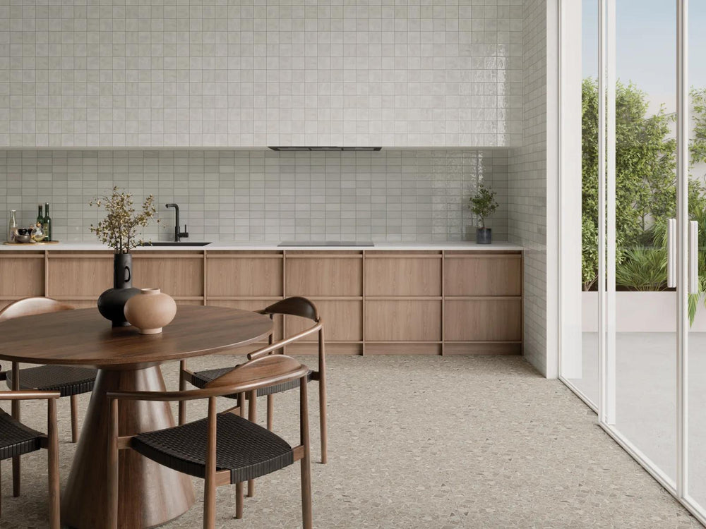 Neutral yet elegant, Marin Pebble Gray 4x4 glossy glazed ceramic tile delivers a sleek and versatile tone that complements a variety of styles.