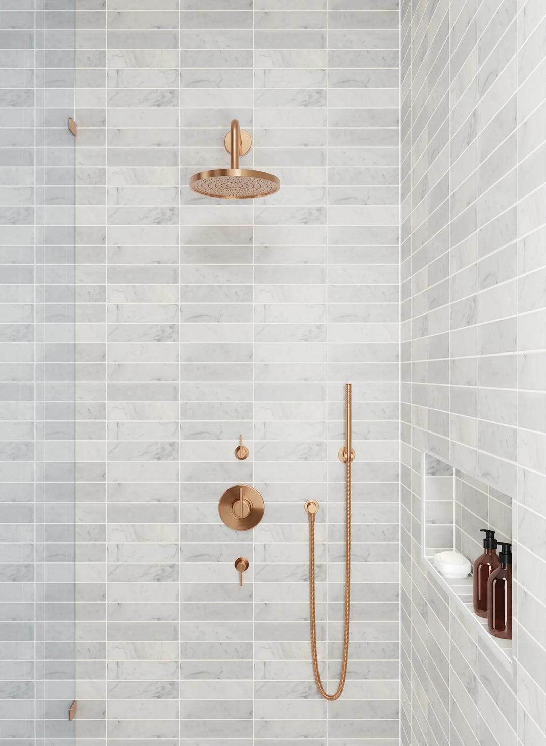 A refined space highlighted by Monet White Carrara 2X8 Honed Marble, where its timeless veining and honed finish create a sophisticated ambiance.