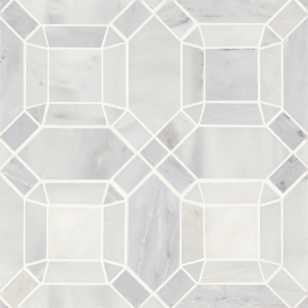 A top-down view of Monet Oriental White Honed Marble Mosaic 1 highlights its luminous white surface with intricate veining, adding an elegant touch to any space.