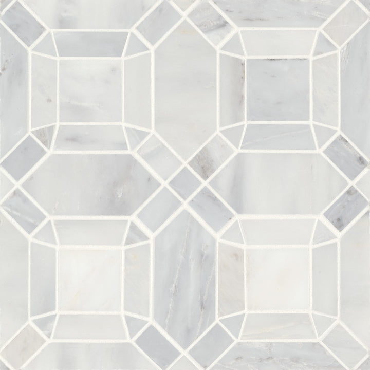 A top-down view of Monet Oriental White Honed Marble Mosaic 1 highlights its luminous white surface with intricate veining, adding an elegant touch to any space.