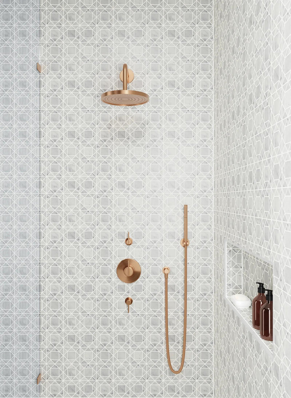 The subtle charm of Monet White Carrara honed marble mosaic introduces a classic yet contemporary aesthetic, enriching spaces with refined detail.