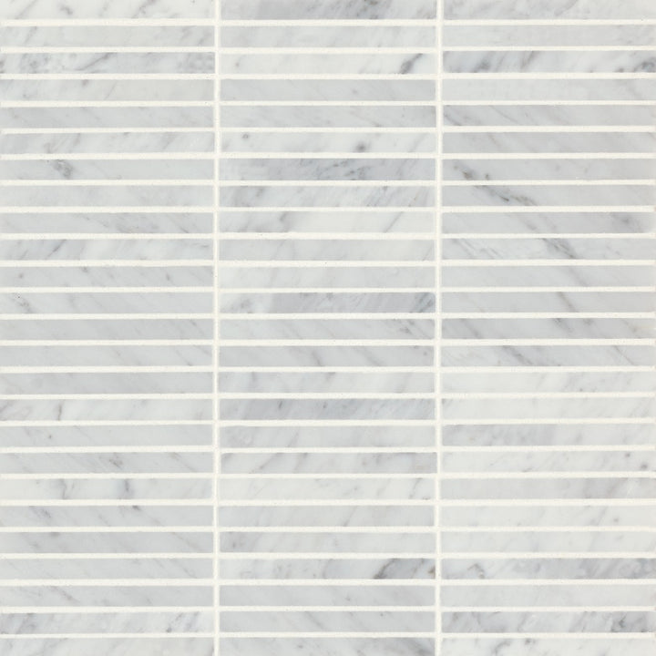 A high-definition top-down view of Monet White Carrara Honed Marble Mosaic 3 brings out its smooth honed texture, accentuated with soft veining for a timeless look.