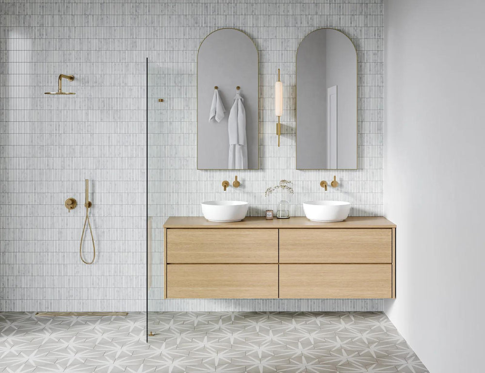 A timeless accent for luxurious interiors, Monet White Carrara honed marble mosaic highlights the beauty of natural stone with graceful movement and depth.