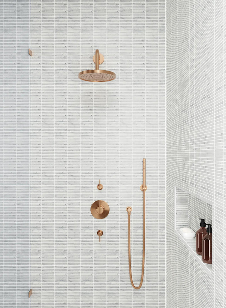 A sophisticated honed marble mosaic, Monet White Carrara Mosaic 3 showcases refined white tones with delicate veining.