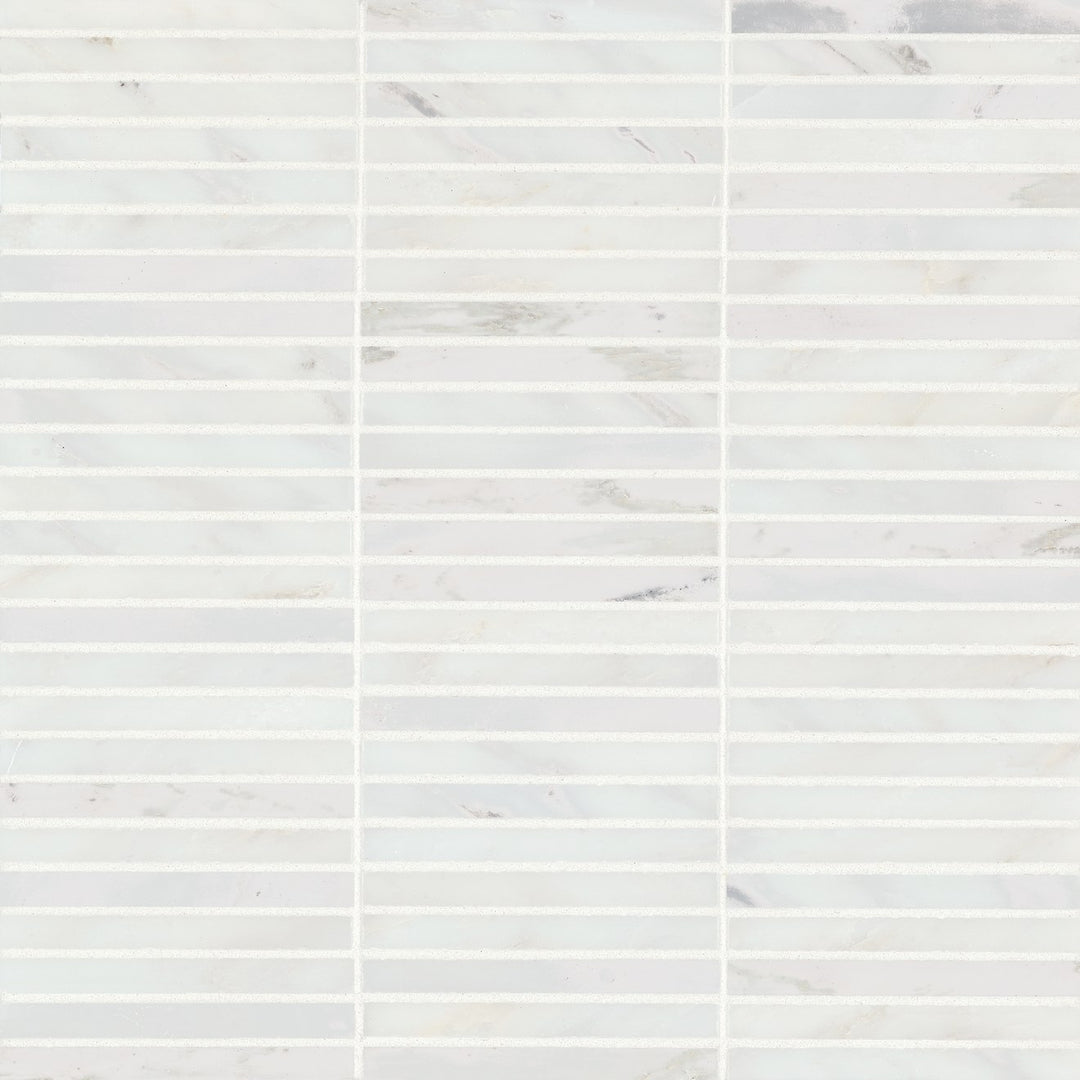 Aerial imagery of Monet Oriental White Honed Marble Mosaic 3 showcases its serene white backdrop with elegant gray veining, adding a refined elegance to any setting.