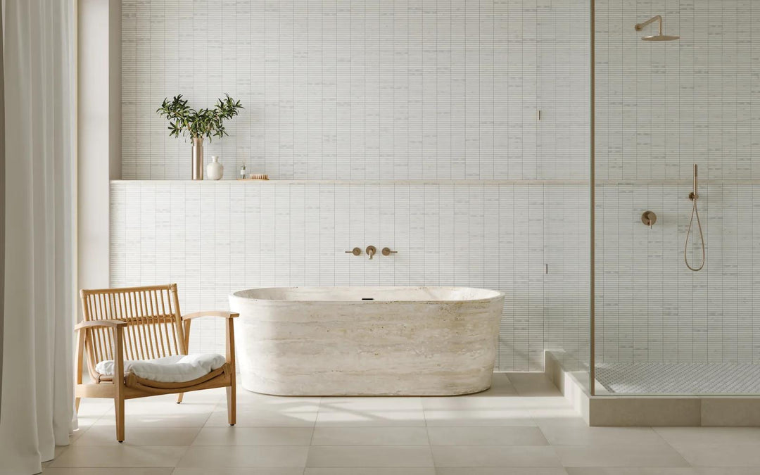 A refined touch for any space, Monet Oriental White honed marble mosaic brings understated luxury with its delicate veining and smooth finish.