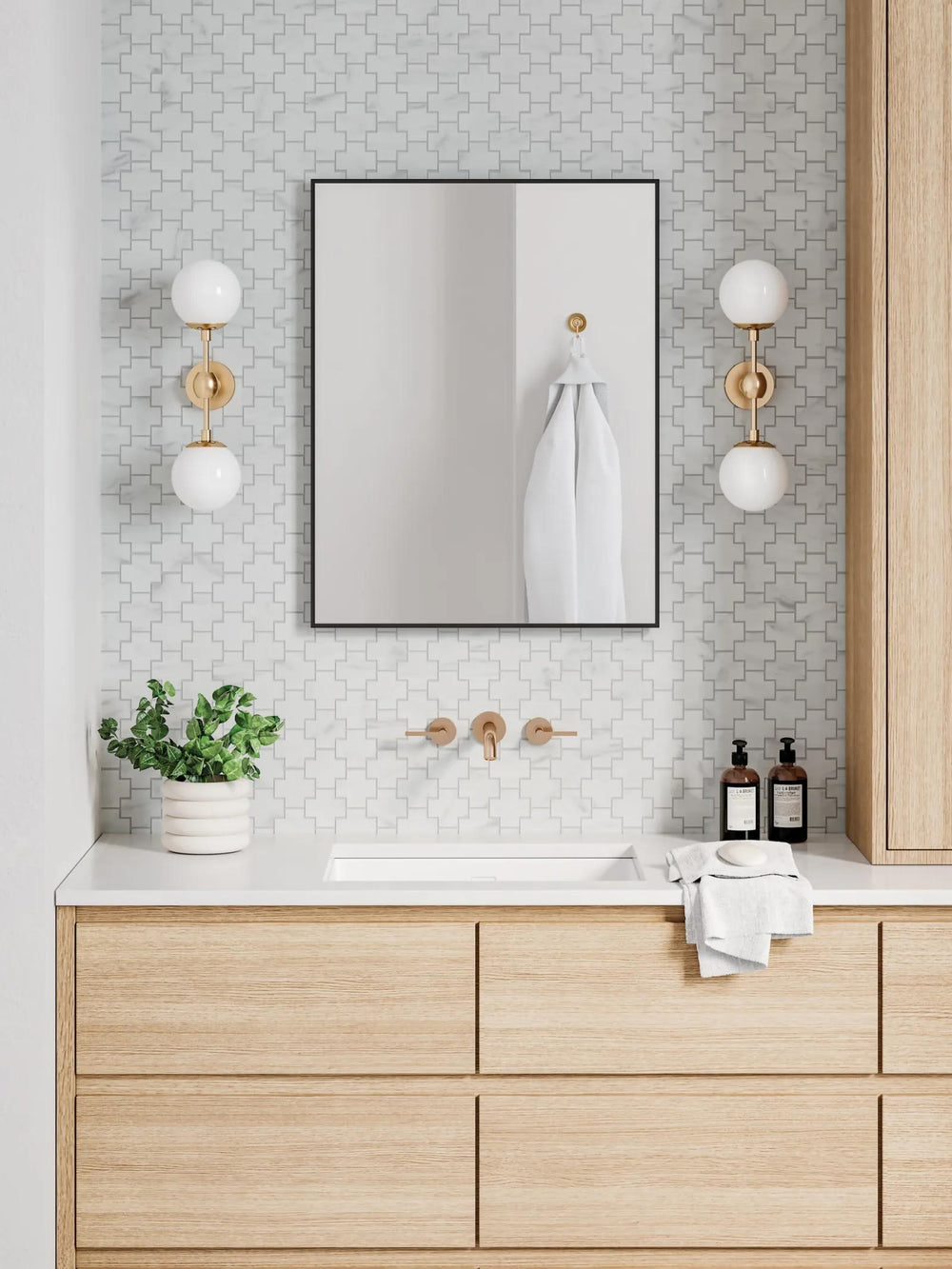 Timeless beauty comes to life in Monet White Carrara honed marble mosaic, where soft white tones and intricate veining create a luxurious feel.