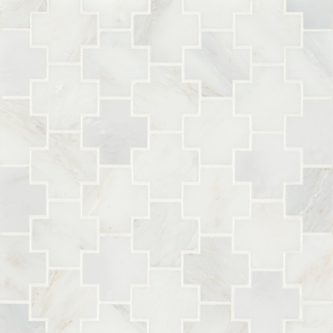 Flat lay of Monet Oriental White Honed Marble Mosaic, displaying a bright white surface with subtle, refined veining for a sophisticated design.