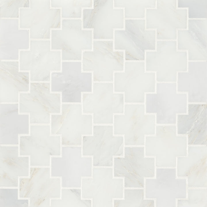 Flat lay of Monet Oriental White Honed Marble Mosaic, displaying a bright white surface with subtle, refined veining for a sophisticated design.