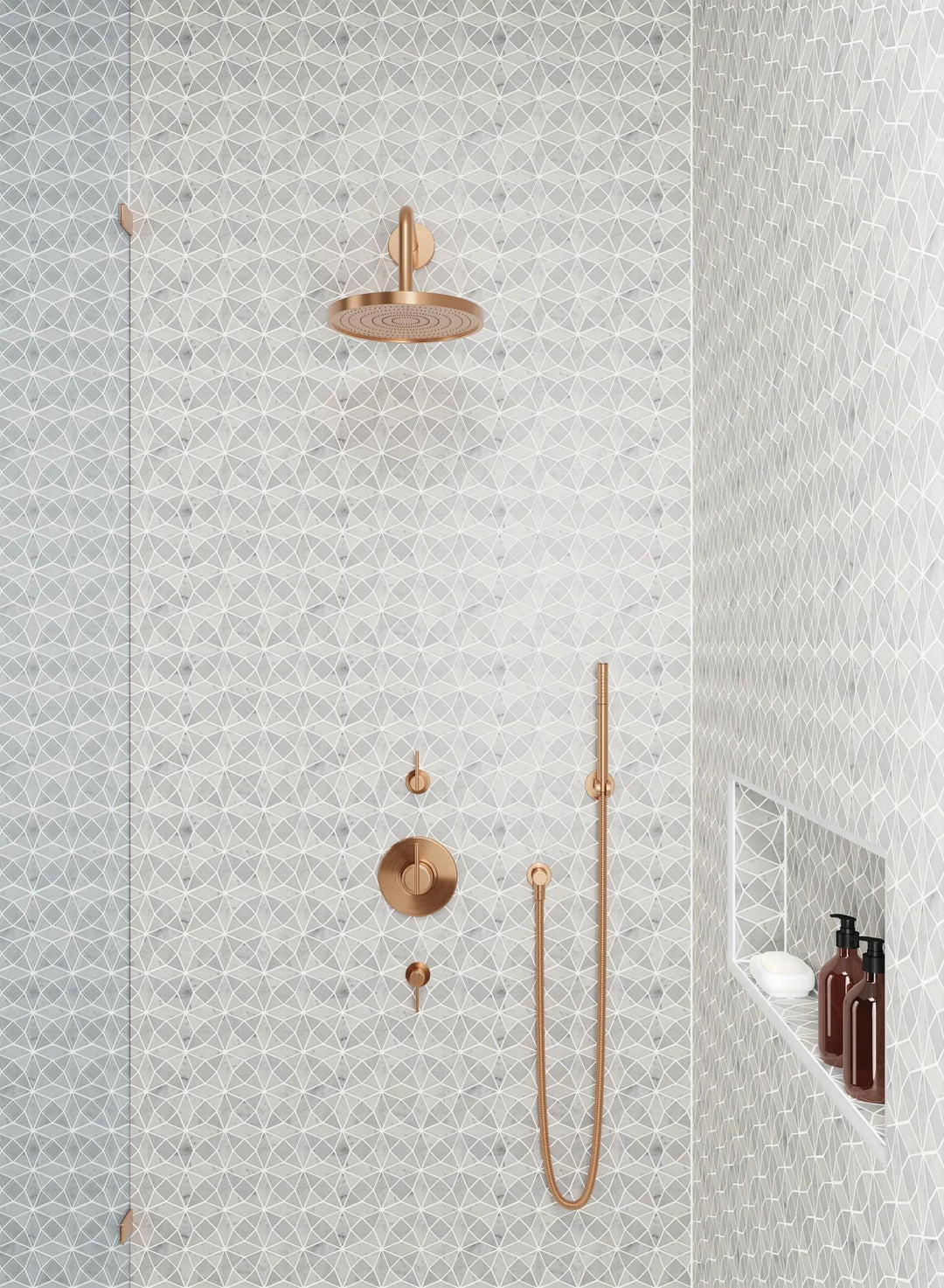 An exquisite arrangement of Monet White Carrara Honed Marble Mosaic, creating a soft, neutral elegance with its refined honed finish.