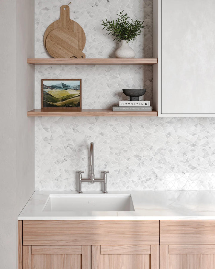 Bringing effortless elegance to interiors, Monet Oriental White honed marble mosaic enhances surfaces with its soft tones and refined texture.