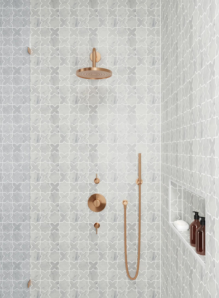 A luxurious honed marble mosaic, Monet White Carrara Mosaic 6 offers a sleek and polished aesthetic with soft grey veining.