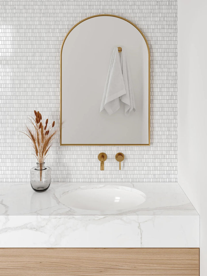 Subtle yet striking, Monet White Carrara honed marble mosaic transforms spaces with its delicate veining and sophisticated honed surface.