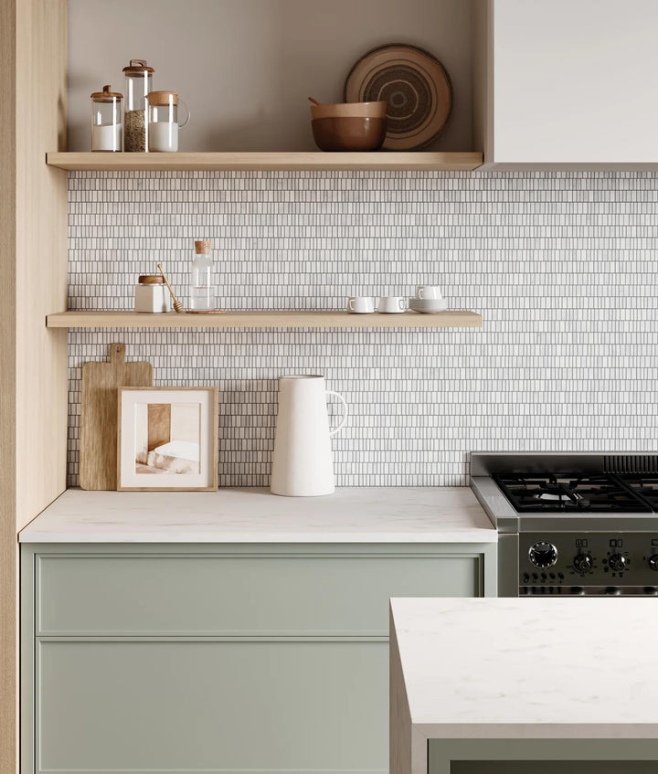 The elegance of natural stone shines through Monet Oriental White honed marble mosaic, perfect for adding a refined and calming touch to interiors.