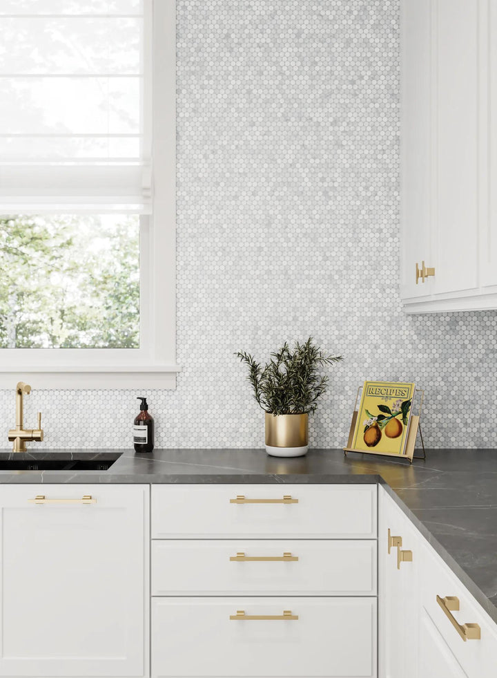 A luxurious addition to any space, Monet White Carrara honed marble mosaic highlights the timeless beauty of marble in a modern, sophisticated way.