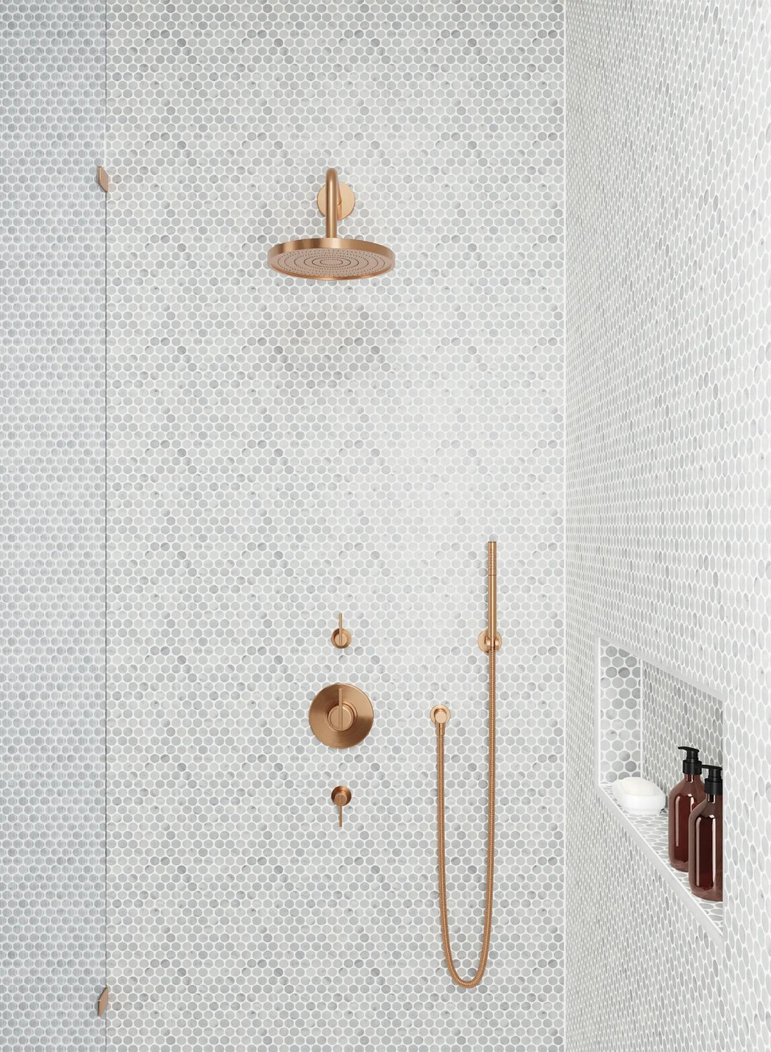 A timeless setting featuring Monet White Carrara Honed Marble Mosaic, bringing a touch of refinement with its soft white tones and honed texture.