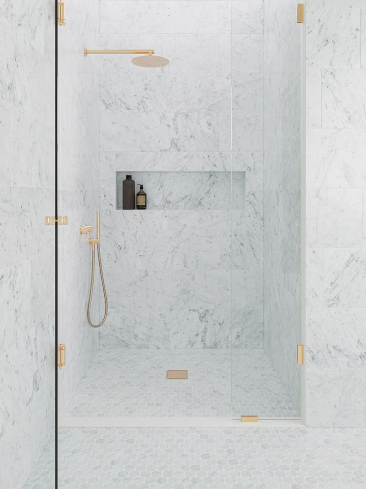 A serene ambiance created by Monet White Carrara Honed Marble Mosaic, where its honed finish and subtle veining enhance the overall aesthetic.