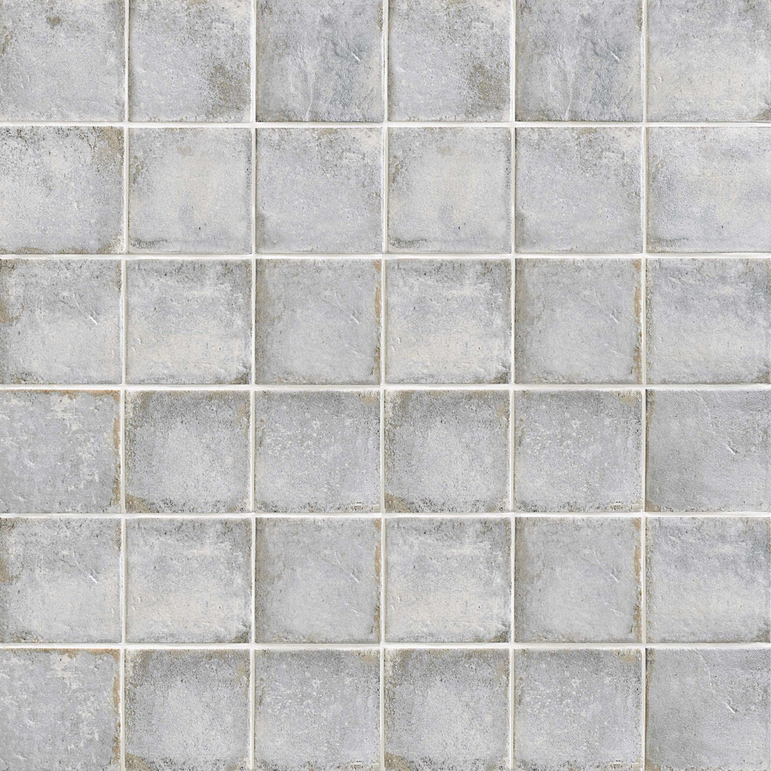 Top-down view of Vivace Atlantic 4X4 Gloss Glazed Porcelain, featuring a deep oceanic blue with a reflective high-gloss finish for a bold and elegant surface.