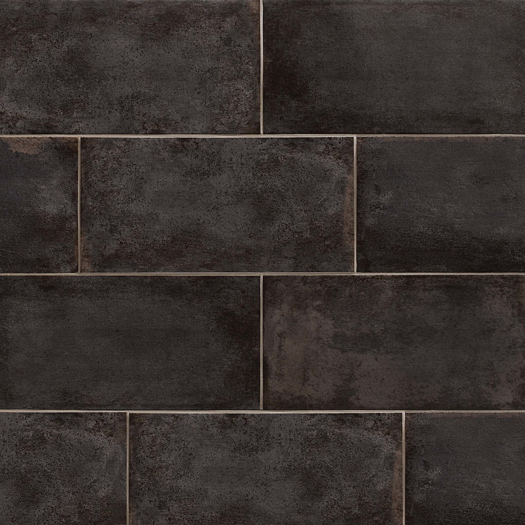 Overhead shot of Vivace Caviar 9X18 Matte Glazed Porcelain, featuring a rich black hue with a soft matte texture, perfect for contemporary interiors.