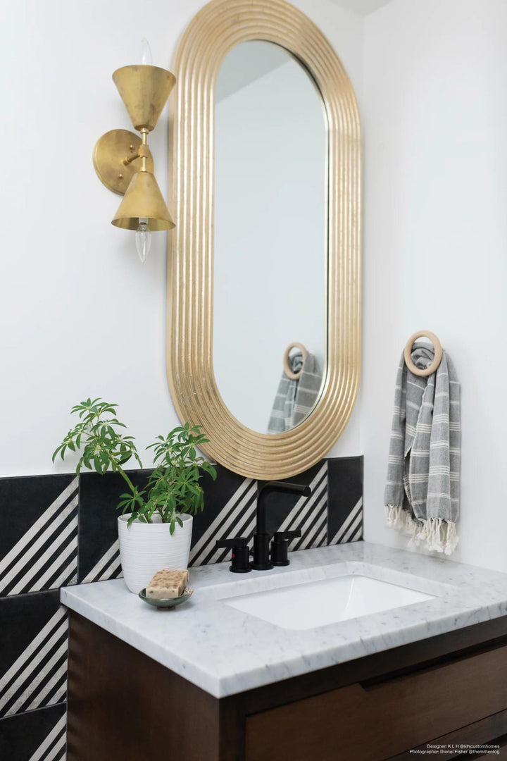 A dramatic black matte tile with subtle variations creates a modern and sophisticated ambiance, effortlessly achieved with Vivace Roads Caviar 9x9 matte glazed porcelain.