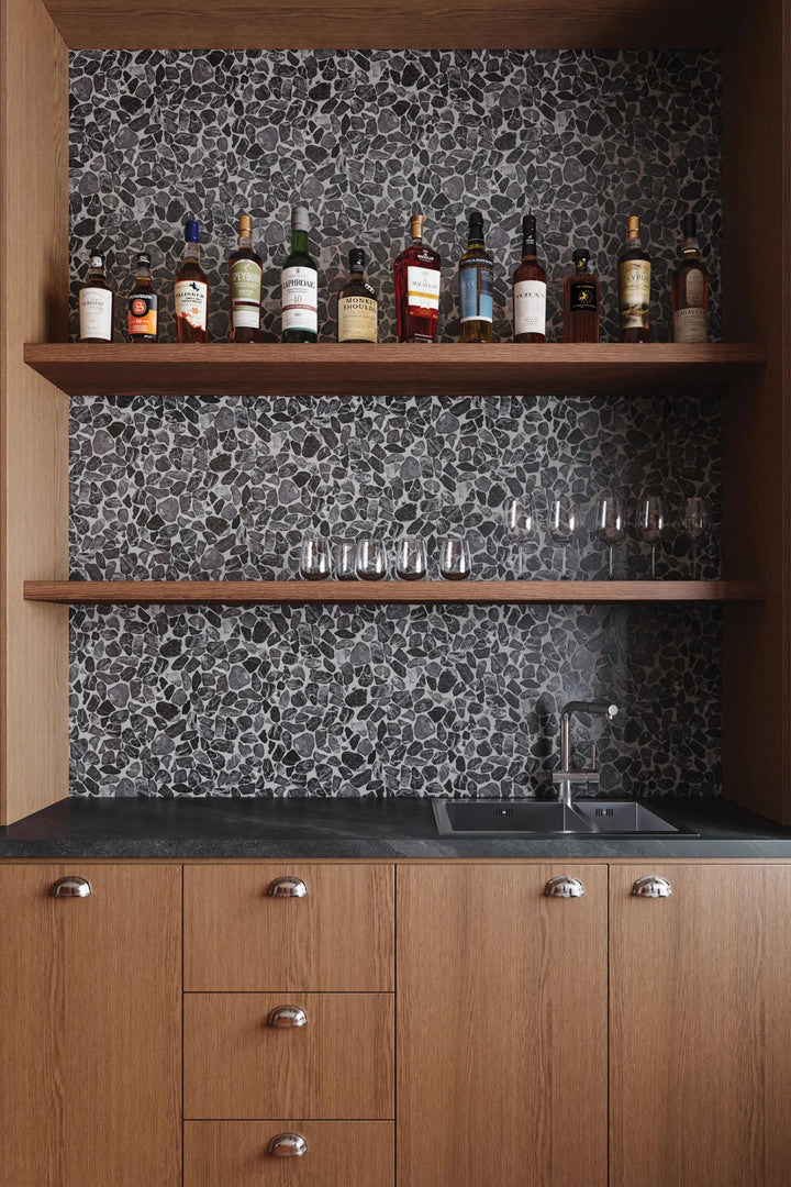 A touch of rustic charm meets organic elegance in Waterbrook Rosso Levanto sliced pebble natural stone mosaic, creating a warm and inviting ambiance.