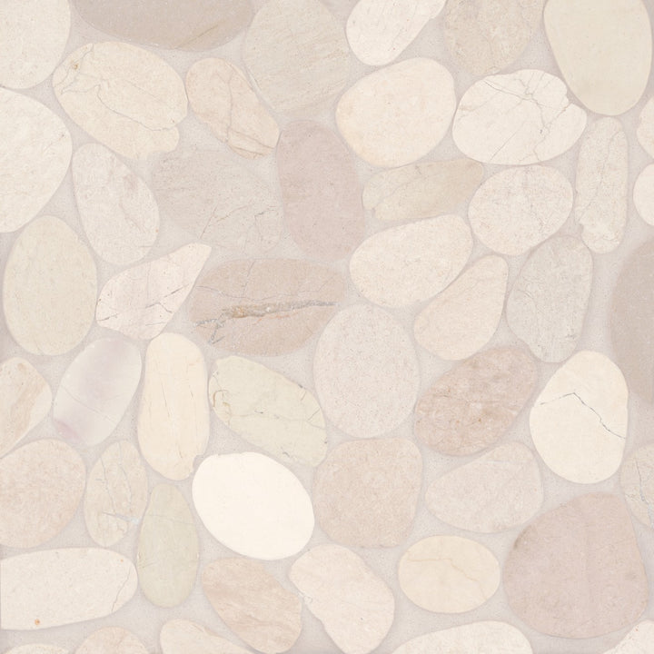 Flat lay of Waterbrook White Sliced Pebble Natural Stone Mosaic, showcasing a collection of soft white pebbles with natural variation, ideal for serene and coastal designs.