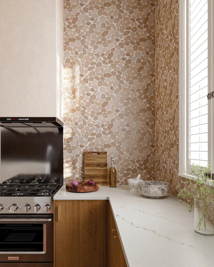 Natural textures blend harmoniously in Waterbrook Tan sliced pebble natural stone mosaic, offering a timeless, earthy appeal perfect for various settings.