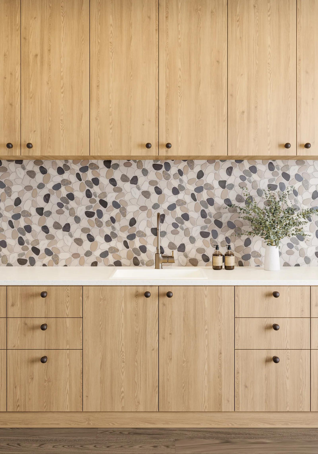 Inspired by coastal beauty, Waterbrook Malaga Bay sliced pebble natural stone mosaic delivers a textured, organic look that enhances any environment.