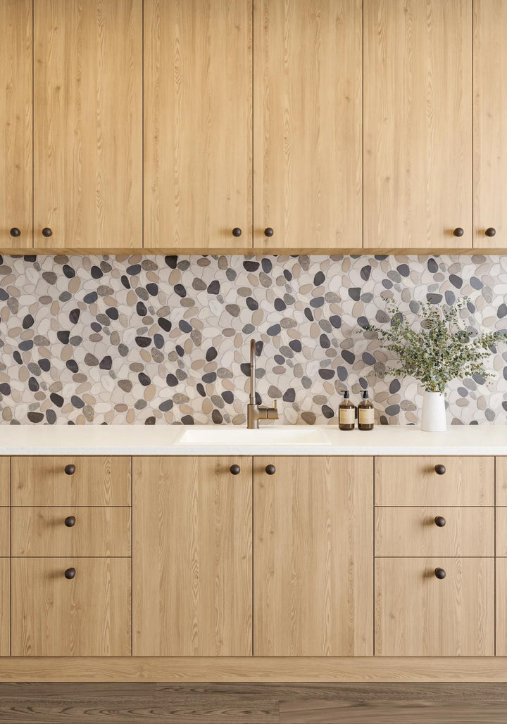 Inspired by coastal beauty, Waterbrook Malaga Bay sliced pebble natural stone mosaic delivers a textured, organic look that enhances any environment.