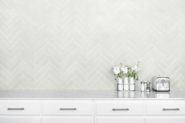 A soft matte surface and moonlit elegance define Zenia Moon 2.5X9 glazed porcelain, offering a subtle, sophisticated ambiance.