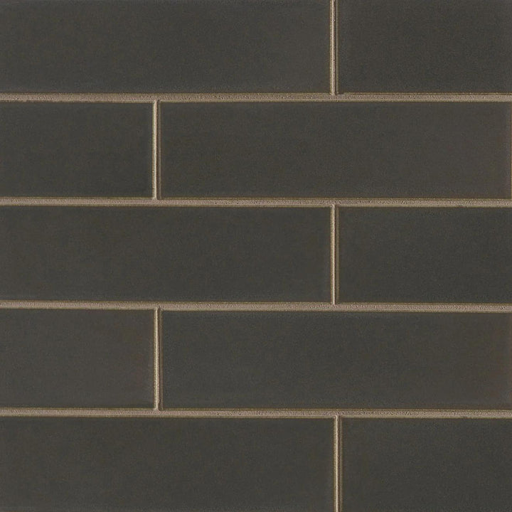 Overhead image of Zenia Orion 2.5X9 Matte Glazed Porcelain, capturing a celestial-inspired dark hue with a subtle matte surface for an elegant finish.