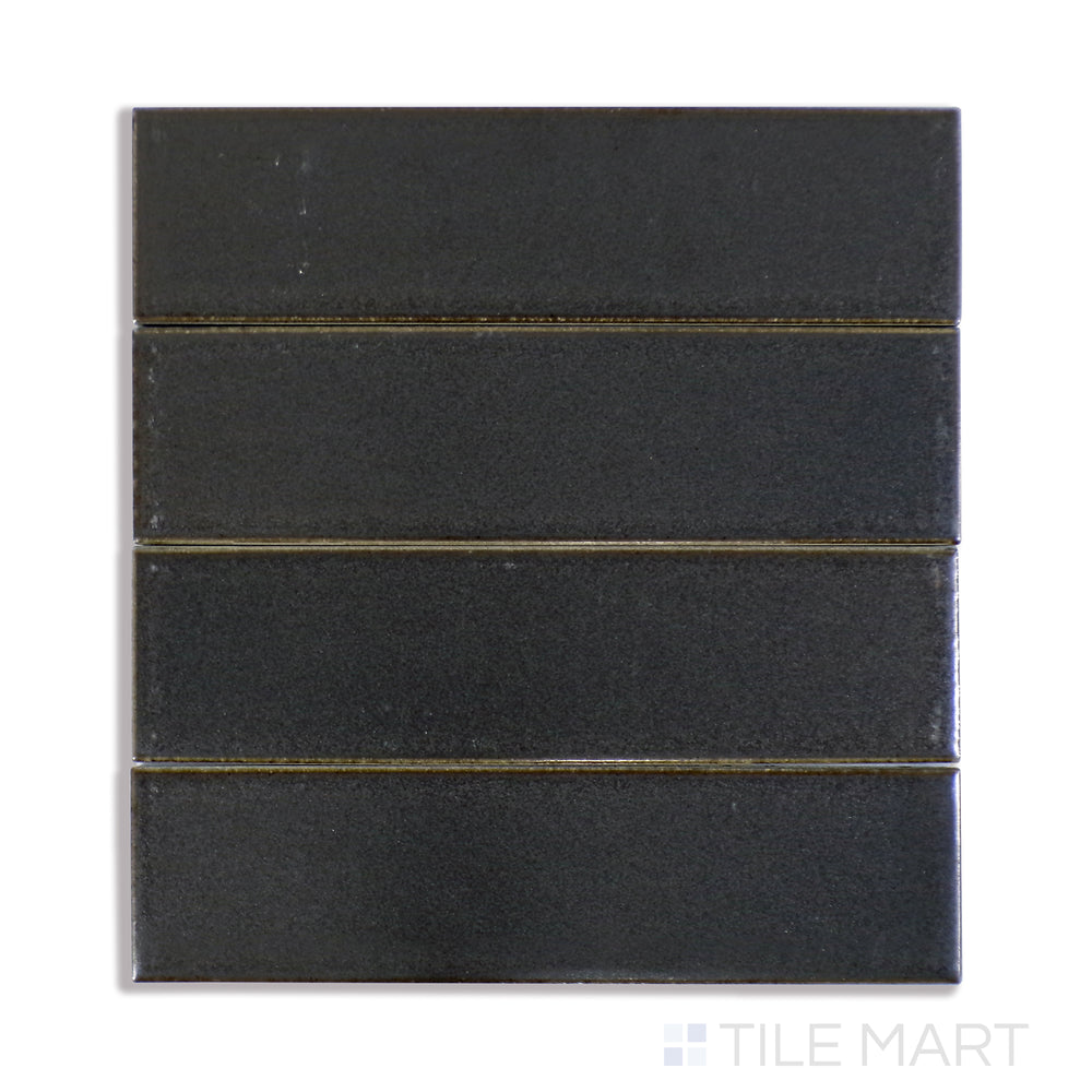 A sharp close-up of Zenia Orbit 2.5X9 Matte Glazed Porcelain tile accentuates its cosmic grey shade and subtle matte finish, offering a contemporary and versatile look.