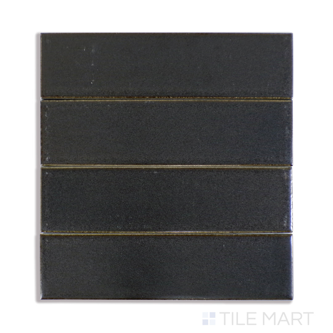 A sharp close-up of Zenia Orbit 2.5X9 Matte Glazed Porcelain tile accentuates its cosmic grey shade and subtle matte finish, offering a contemporary and versatile look.