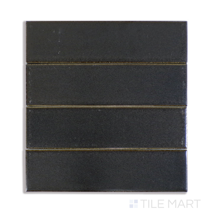 A sharp close-up of Zenia Orbit 2.5X9 Matte Glazed Porcelain tile accentuates its cosmic grey shade and subtle matte finish, offering a contemporary and versatile look.