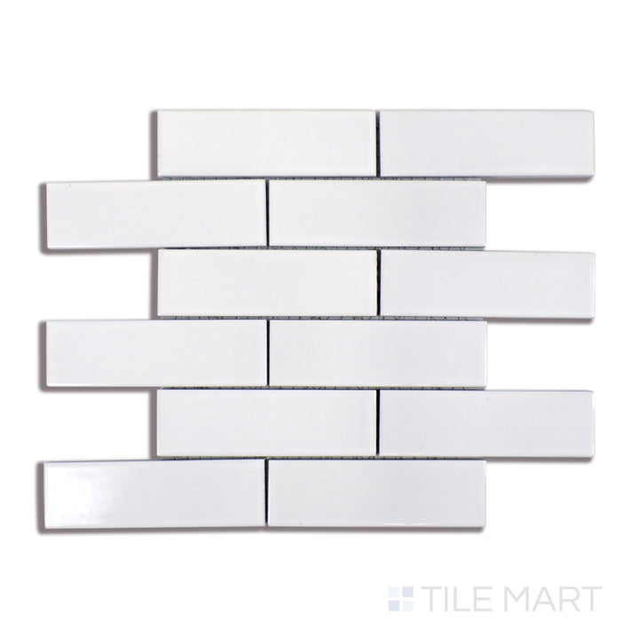 A precise close-up of Zenia Milky Way Rectangle Gloss Glazed Porcelain Mosaic showcases its brilliant white tones and high-shine finish, ideal for creating a luminous space.