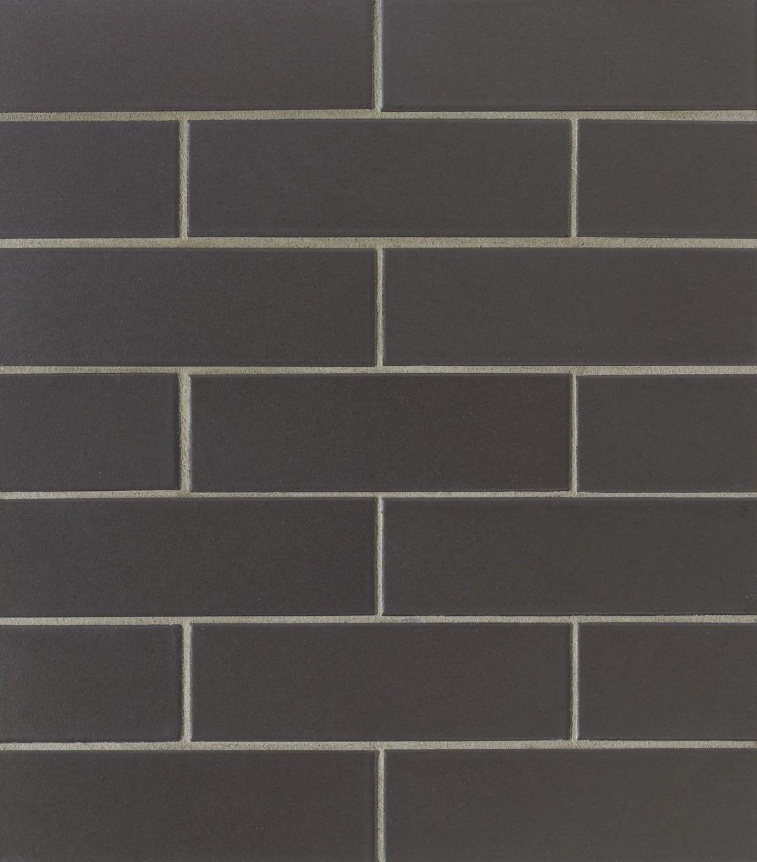 Aerial view of Zenia Gravity Rectangle Matte Glazed Porcelain Mosaic, presenting a rich, grounding grey shade with a smooth matte texture.