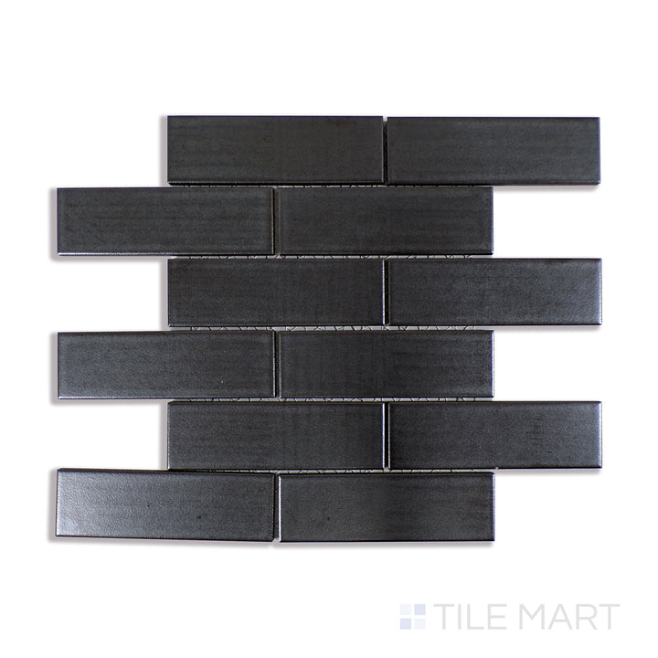 A sharp macro shot of Zenia Gravity Rectangle Matte Glazed Porcelain Mosaic emphasizes its neutral grey shades and velvety matte finish, blending seamlessly into contemporary spaces.