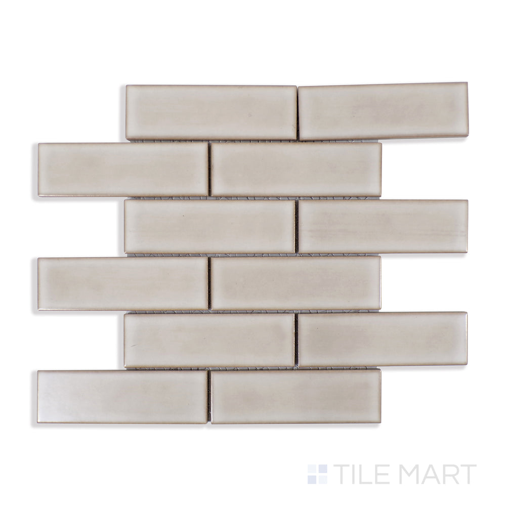 A stunning close-up of Zenia Solar Rectangle Matte Glazed Porcelain Mosaic showcases its warm, sunlit hue and non-reflective matte finish, ideal for cozy yet contemporary settings.