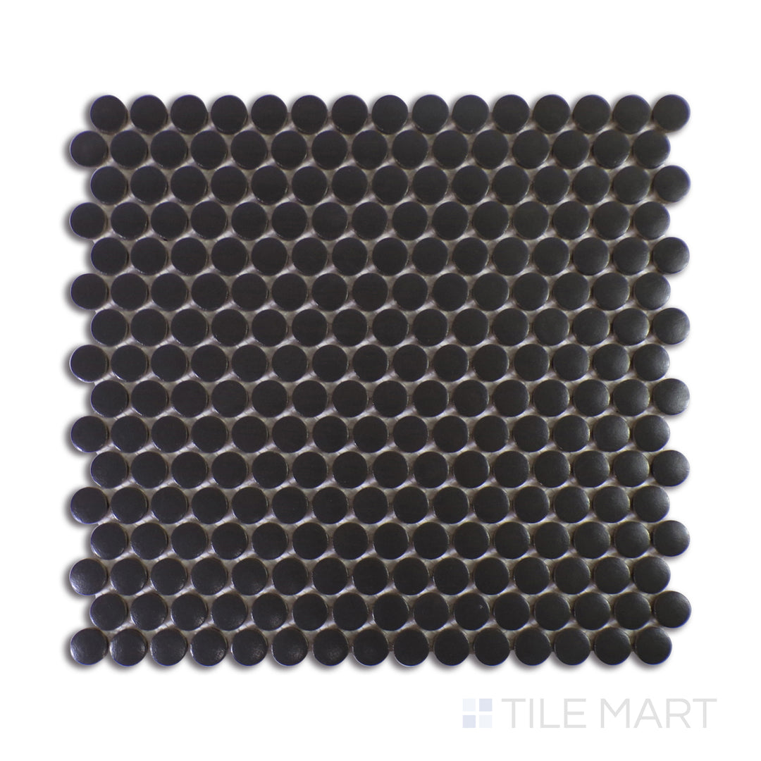 A finely detailed close-up of Marin Midnight Tide 3/4" Penny Round Matte Glazed Porcelain Mosaic reveals its deep navy blue tones and matte texture, bringing a bold, oceanic feel.